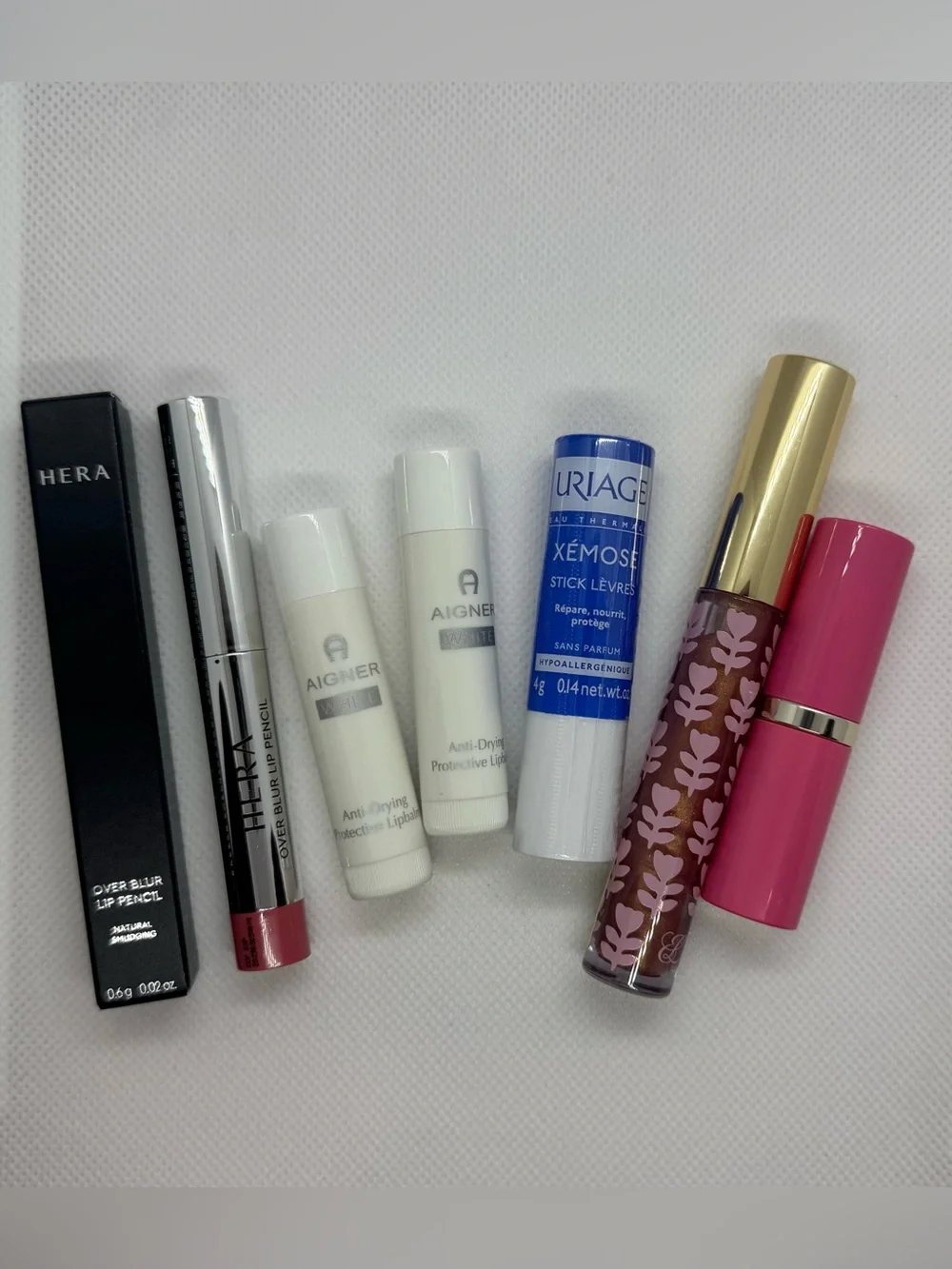 Mixed Lip Product Bundle: Lipstick, Gloss, Balm, Pencil - HERA, Uriage +